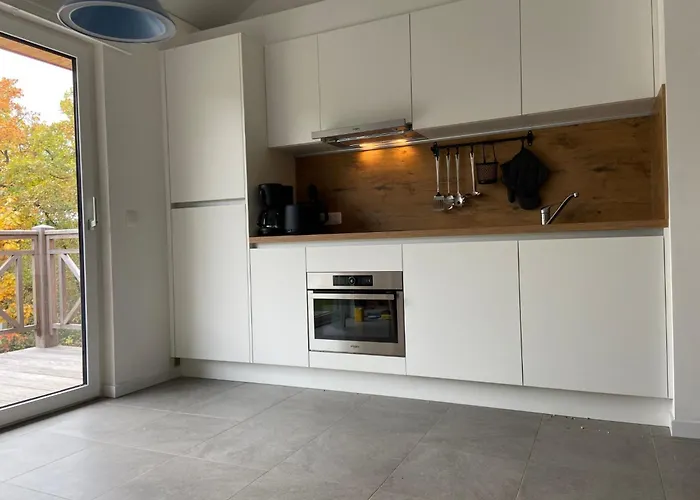 Modernes Fuer 4 Personen In Einem Waldpark By Interhome